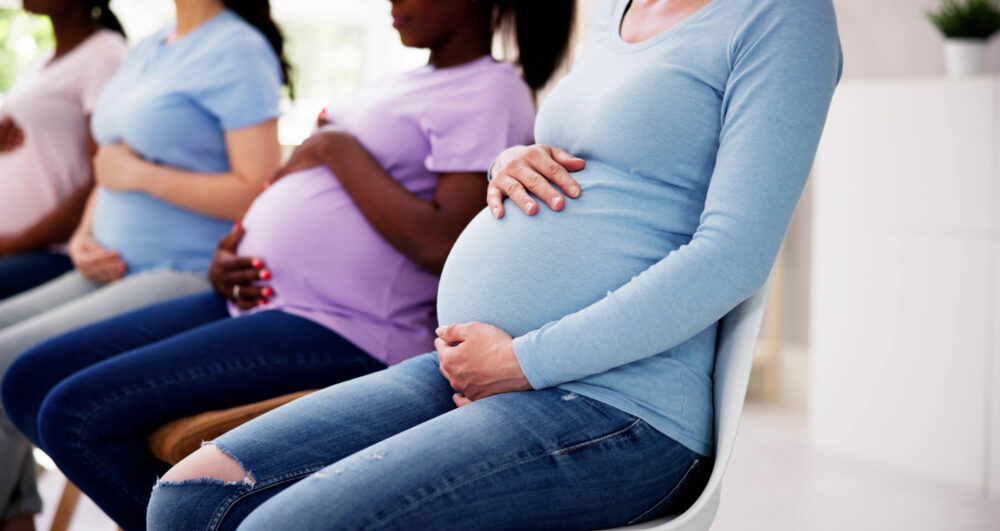 Pregnant Woman Group In Row. Young Mothers